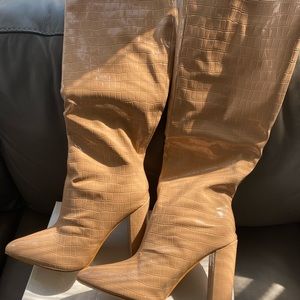 Tan tall boot with 3 1/2 inch heel